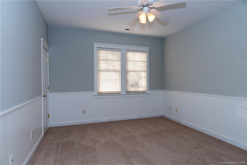 8319 Townley Road Huntersville, NC 28078 - Photo 13 of 17 a view of an empty room with a window