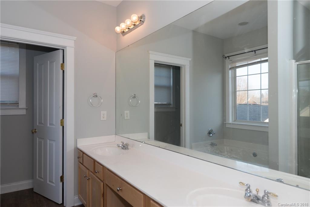 8319 Townley Road Huntersville, NC 28078 - Photo 15 of 17 a bathroom with a sink and a bathtub