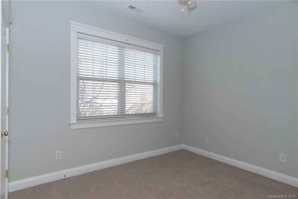 8319 Townley Road Huntersville, NC 28078 - Photo 16 of 17 an empty room with a window
