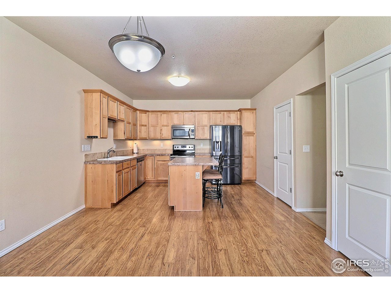 6911 West 3rd Street, Unit 920 Greeley, CO 80634 - Photo 6 of 35 Large Dining Room and Kitchen
