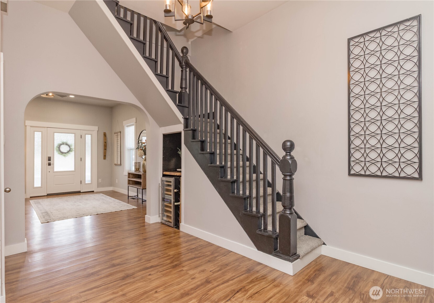 404 Factory Street Southeast Orting, WA 98360 - Photo 16 of 39 a view of an entryway wooden floor and stairs