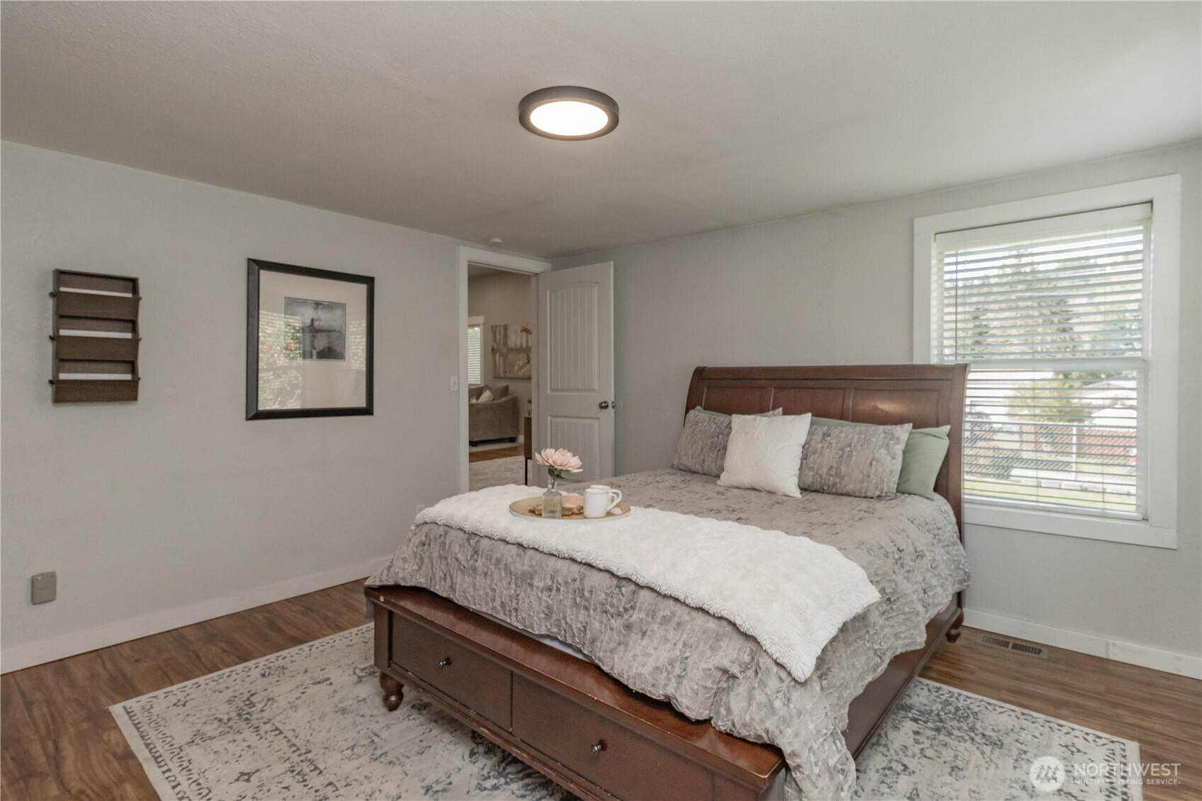 404 Factory Street Southeast Orting, WA 98360 - Photo 20 of 39 a bedroom with bed and a window