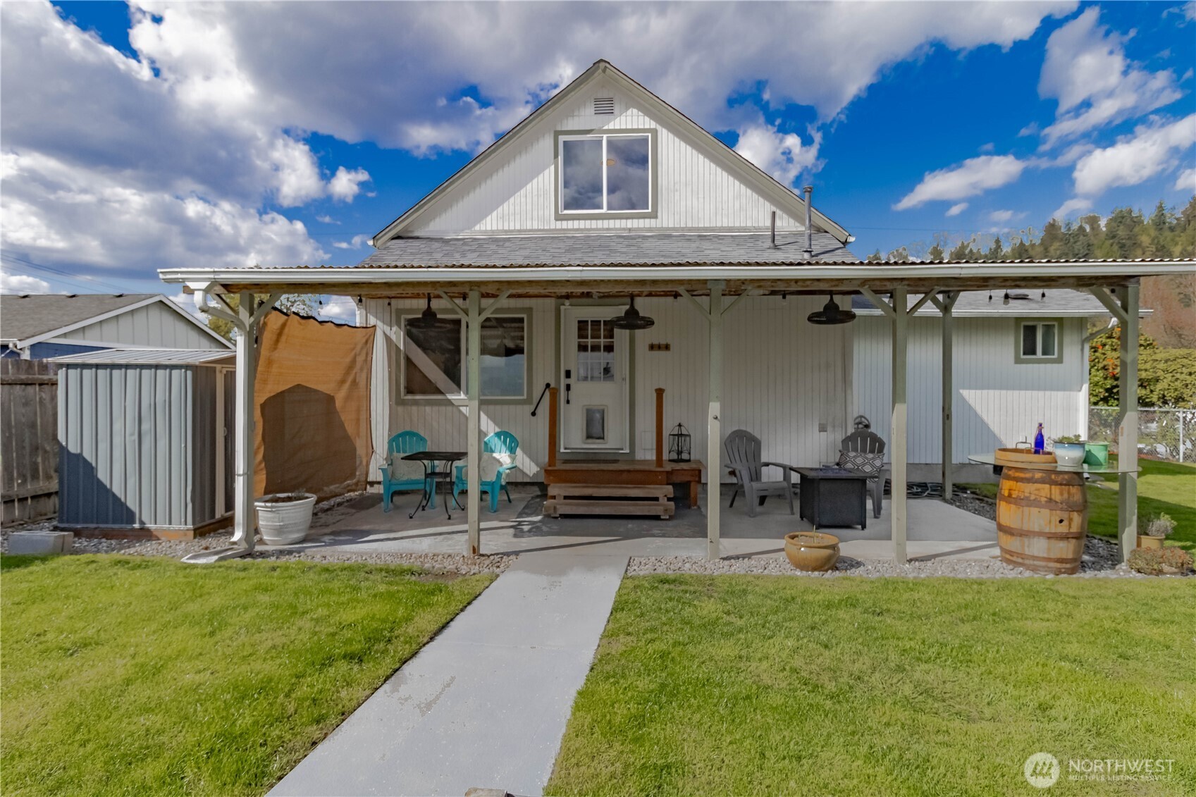 404 Factory Street Southeast Orting, WA 98360 - Photo 30 of 39 a view of a house with patio