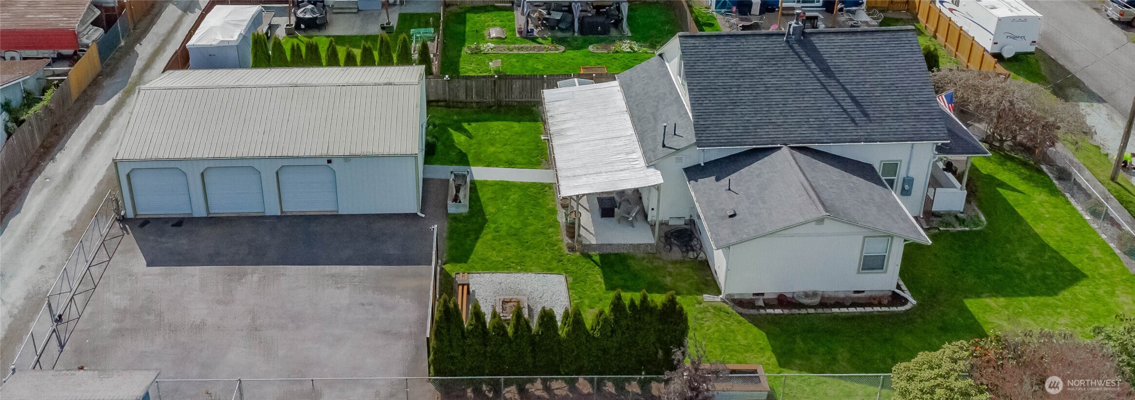 404 Factory Street Southeast Orting, WA 98360 - Photo 39 of 39 a aerial view of a house with a yard