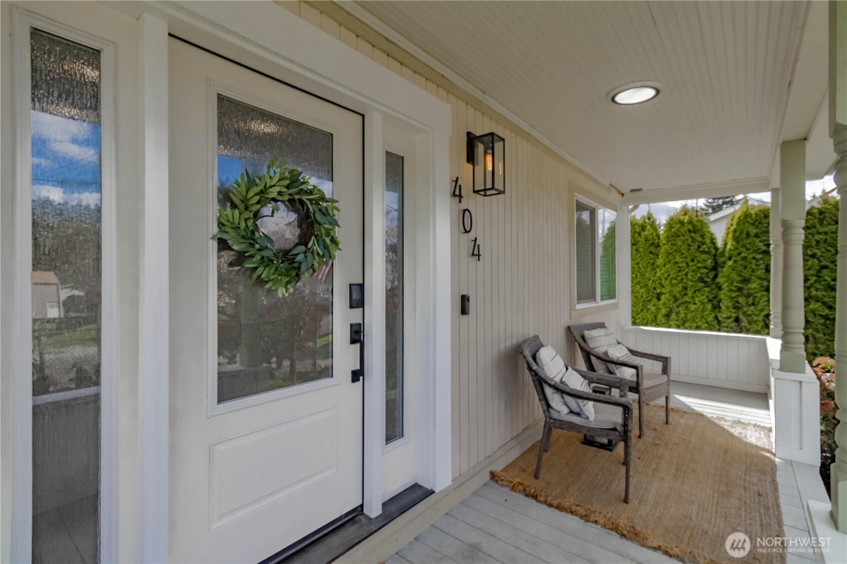 404 Factory Street Southeast Orting, WA 98360 - Photo 4 of 39 a outdoor space with furniture and front door