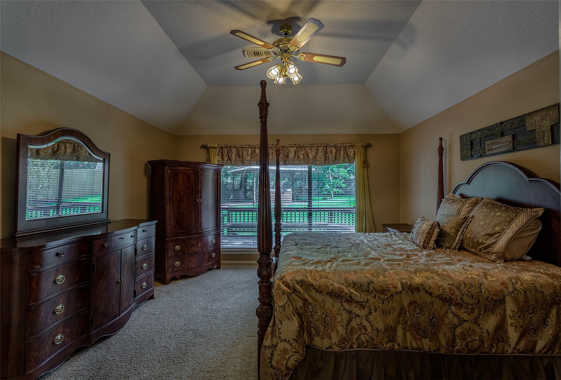 217 Tupelo Lane Conroe, TX 77304 - Photo 14 of 26 Primary Bedroom with view of Back Yard