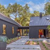 a view of house with outdoor seating space
