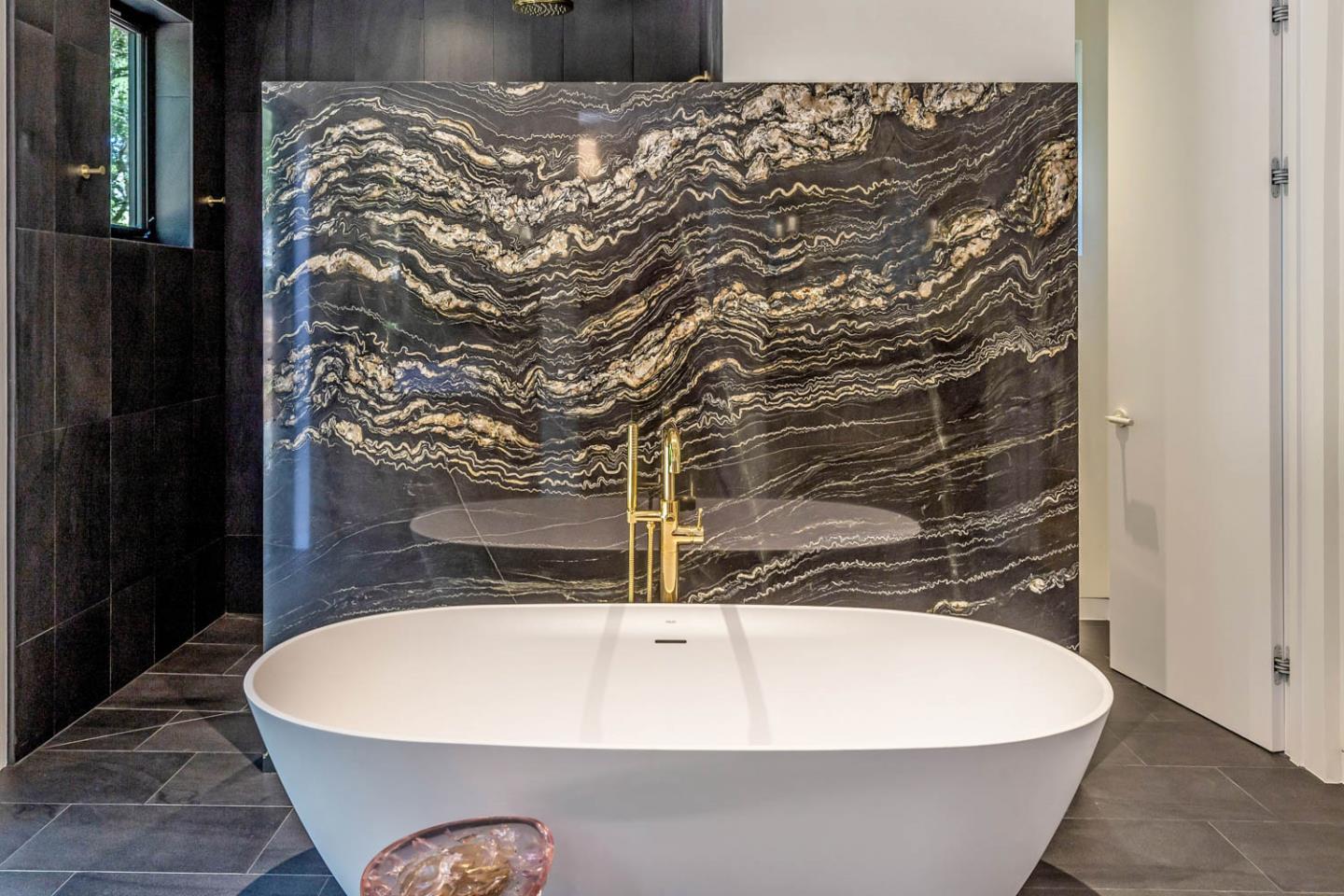 3450 Tripp Road Woodside, CA 94062 - Photo 13 of 27 a white bath tub sitting in a bathroom