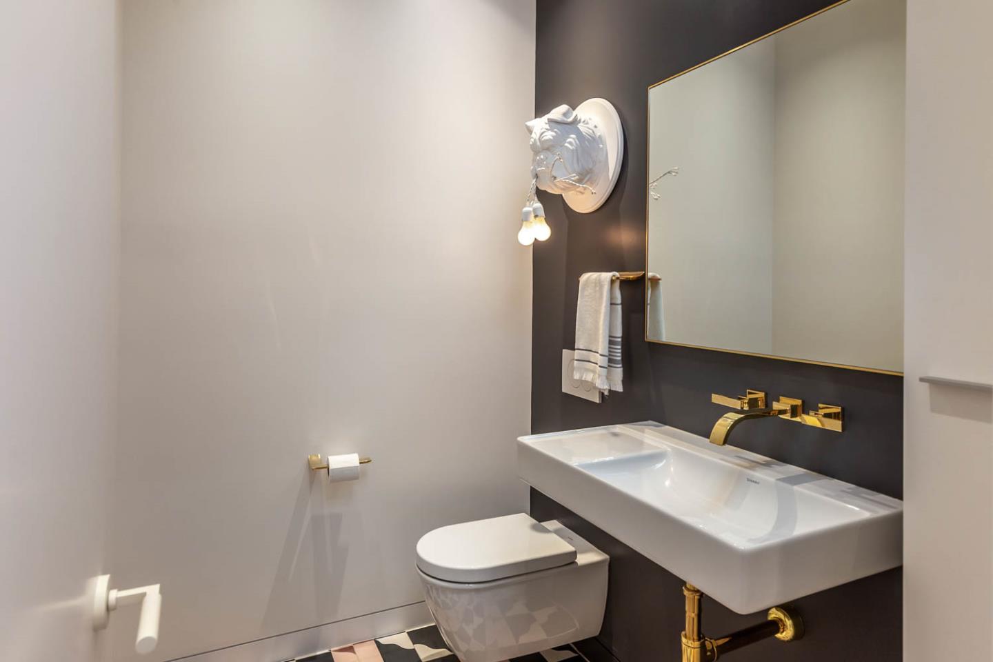 3450 Tripp Road Woodside, CA 94062 - Photo 15 of 27 a bathroom with a sink a toilet and a mirror