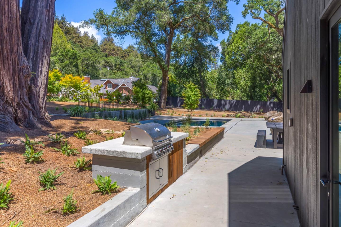 3450 Tripp Road Woodside, CA 94062 - Photo 24 of 27 a view of a couches in backyard of a house