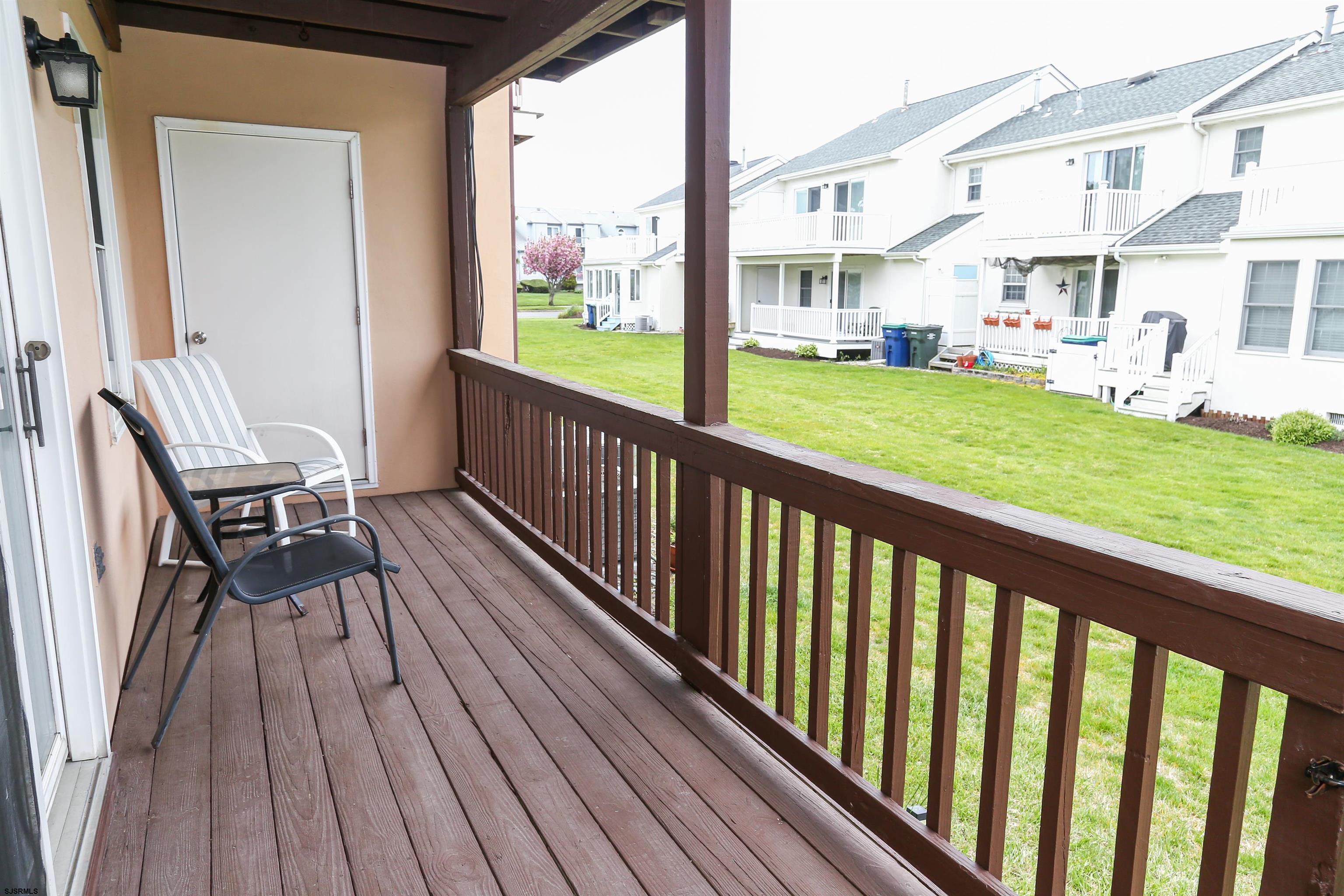 340 Seashell Lane Brigantine, NJ 08203 - Photo 11 of 29 a view of a balcony with wooden floor