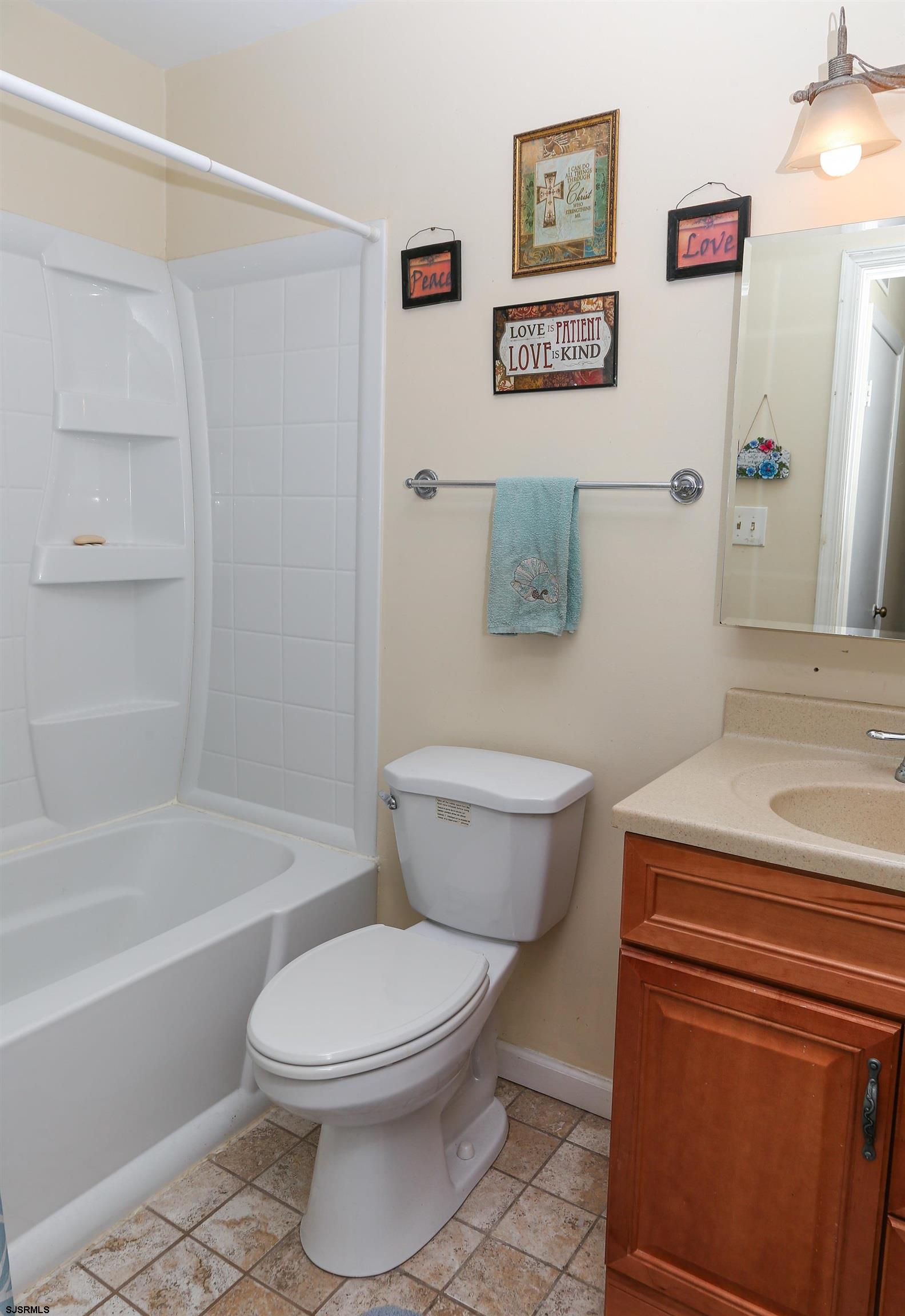 340 Seashell Lane Brigantine, NJ 08203 - Photo 12 of 29 a bathroom with a toilet and a bathtub