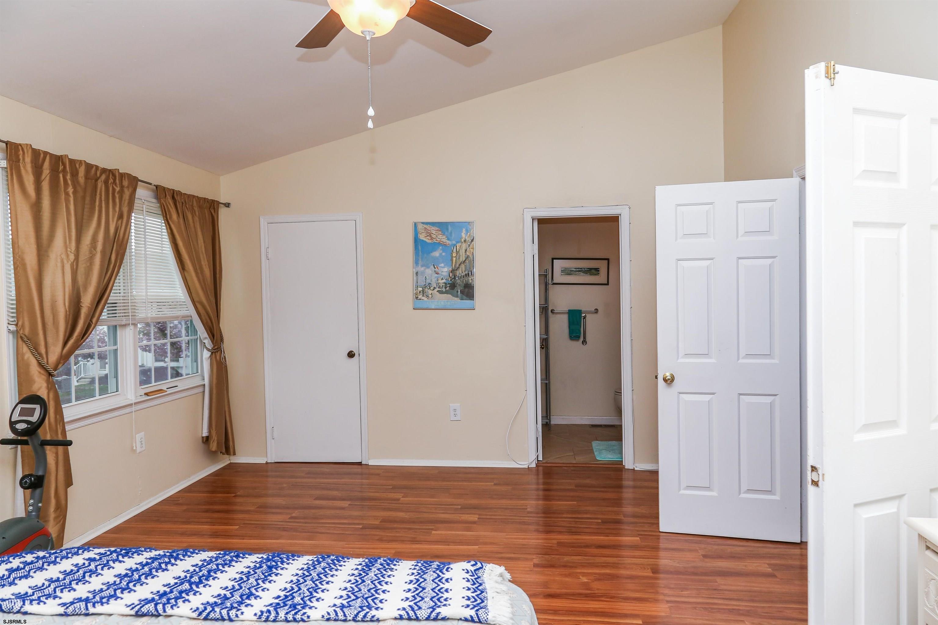 340 Seashell Lane Brigantine, NJ 08203 - Photo 24 of 29 a view of bedroom with window and hardwood floor