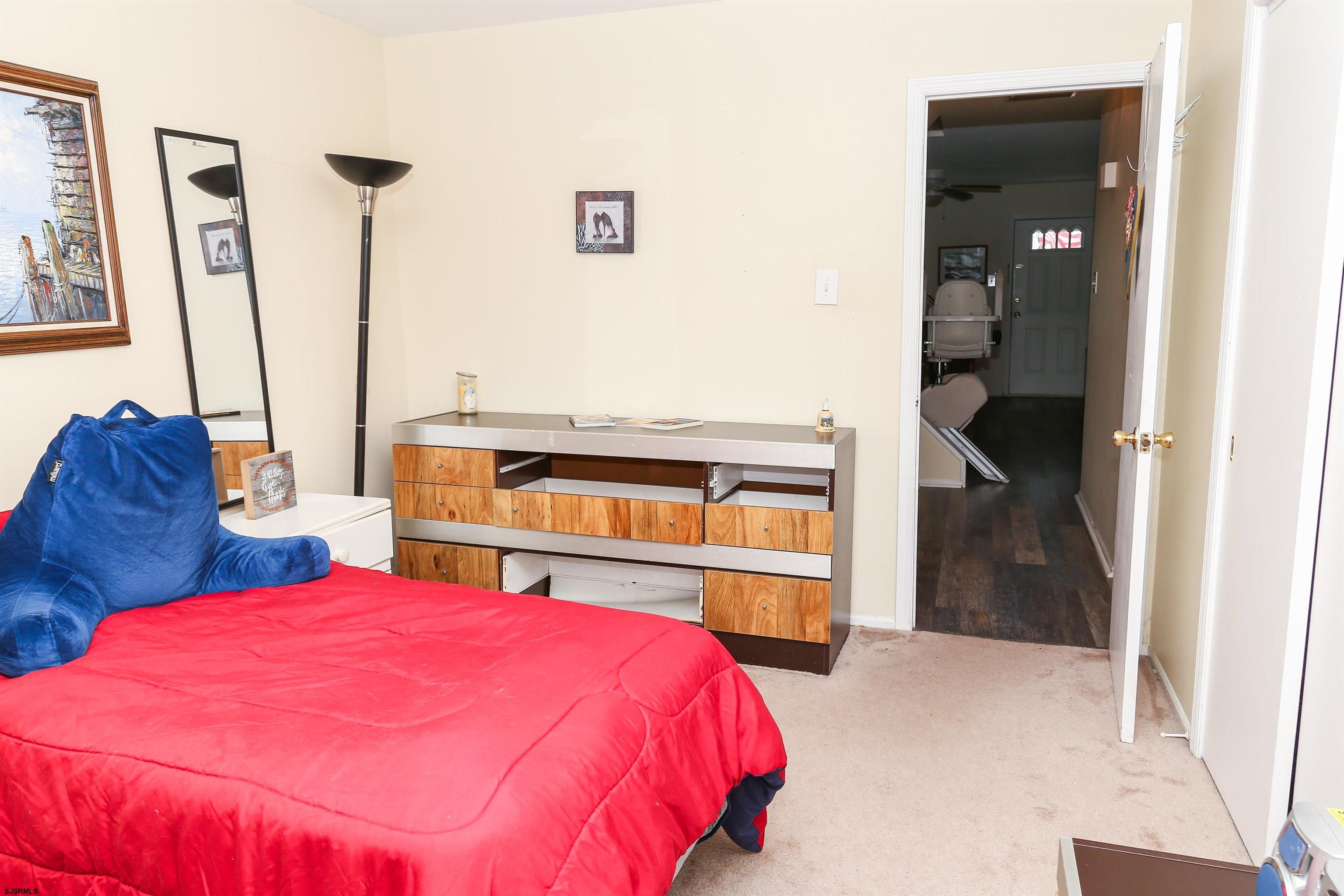 340 Seashell Lane Brigantine, NJ 08203 - Photo 9 of 29 a bed room with a bed and a television