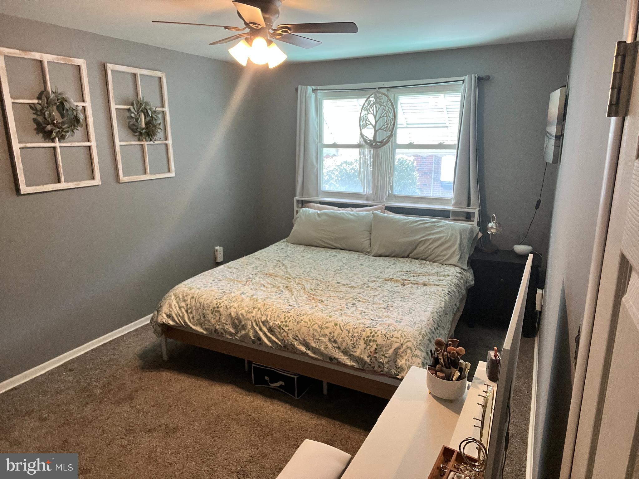 1075 Haverford Road Ridley Park, PA 19078 - Photo 9 of 14 a bedroom with a bed and a window