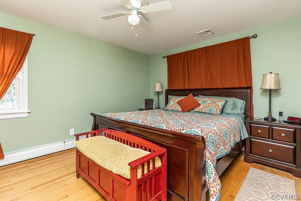 8202 Cardova Road Richmond, VA 23227 - Photo 29 of 48 PRIMARY BEDROOM W/ HW FLOORS, EN-SUITE, WALK-IN CL