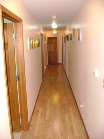 877 North 3450th Road Utica, IL 61373 - Photo 3 of 12 a view of a hallway with wooden floor