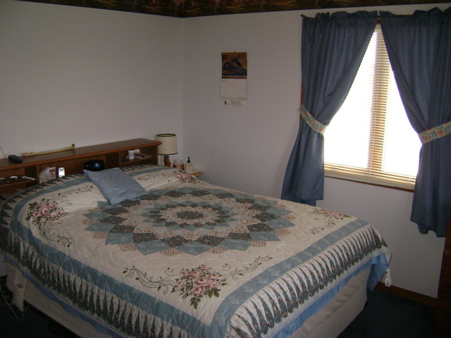 877 North 3450th Road Utica, IL 61373 - Photo 10 of 12 a bedroom with a bed and a window