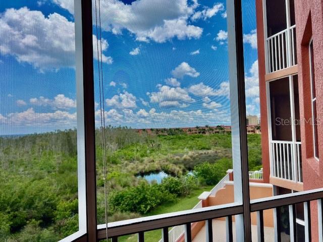 3191 Matecumbe Key Road, Unit 206 Punta Gorda, FL 33955 - Photo 11 of 45 a view of a garden from a balcony