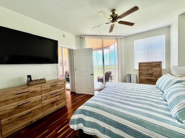 3191 Matecumbe Key Road, Unit 206 Punta Gorda, FL 33955 - Photo 17 of 45 a bedroom with a bed and a flat screen tv