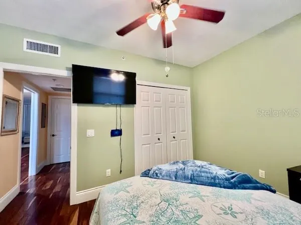 a bathroom with a sink toilet and window
