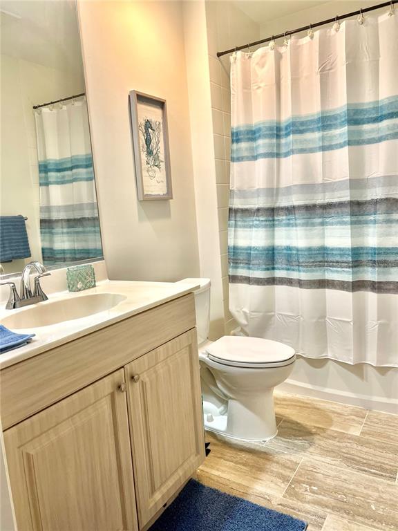 3191 Matecumbe Key Road, Unit 206 Punta Gorda, FL 33955 - Photo 25 of 45 a bathroom with a sink toilet and window