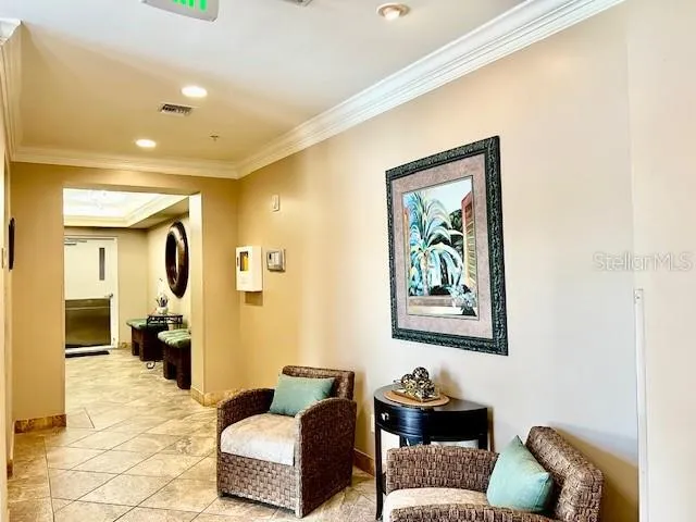 a view of a sign board with potted plants