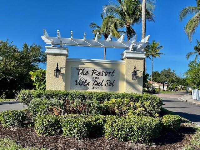 3191 Matecumbe Key Road, Unit 206 Punta Gorda, FL 33955 - Photo 29 of 45 a view of a sign board with potted plants