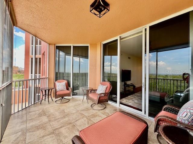 3191 Matecumbe Key Road, Unit 206 Punta Gorda, FL 33955 - Photo 9 of 45 a outdoor space with patio furniture
