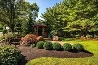 a view of a garden with an outdoor space