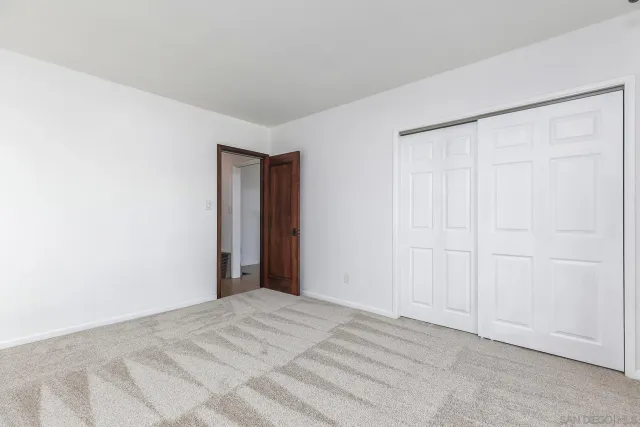 a kitchen with stainless steel appliances granite countertop a refrigerator stove microwave and sink