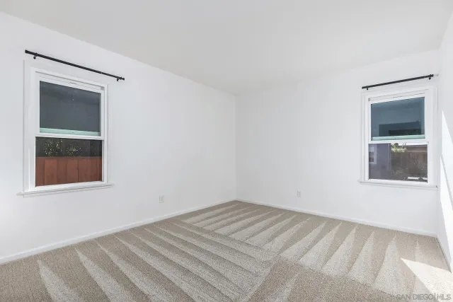 a kitchen with a refrigerator stove and microwave