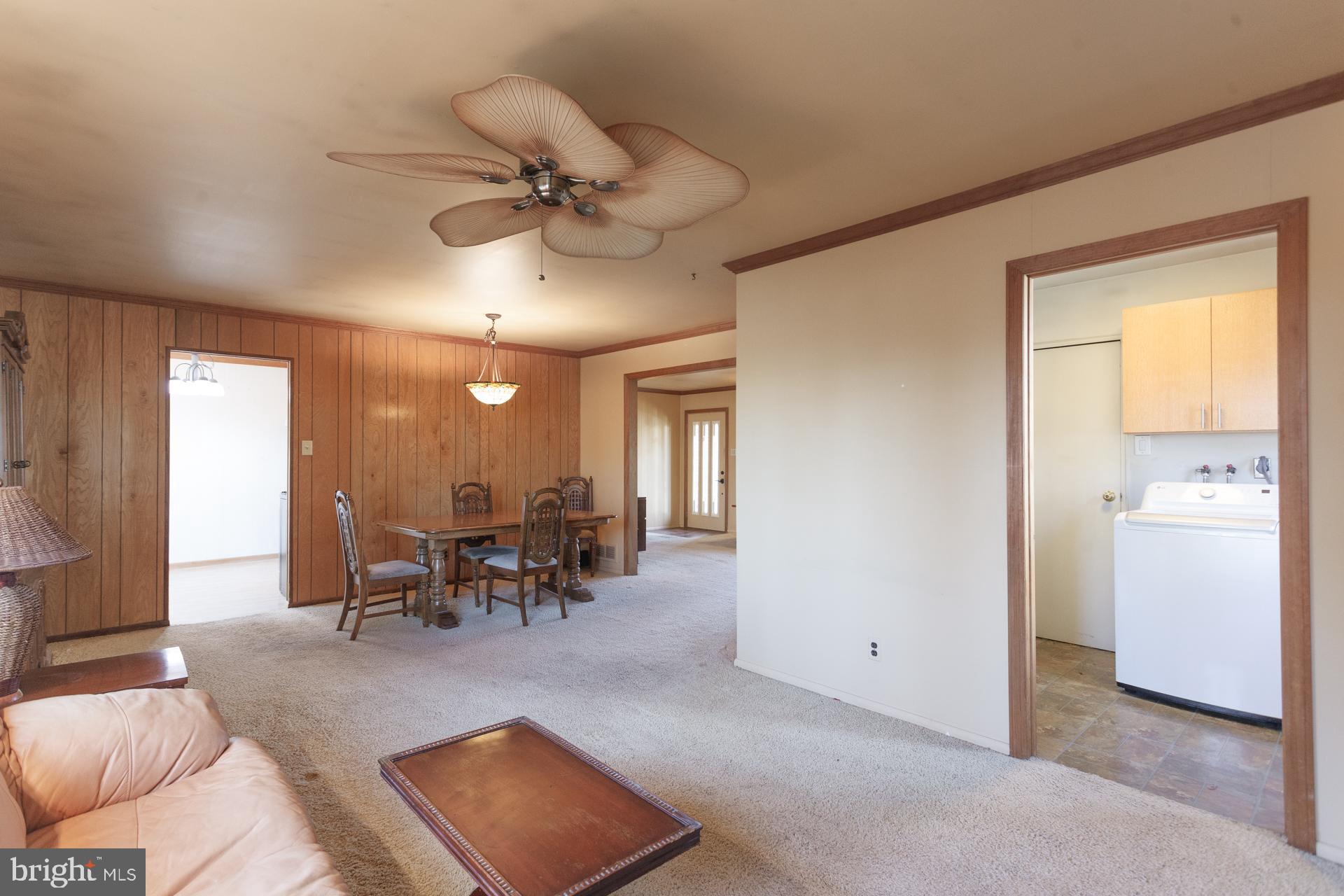 514 Drexel Road Fairless Hills, PA 19030 - Photo 11 of 31 a dining room with furniture and a chandelier