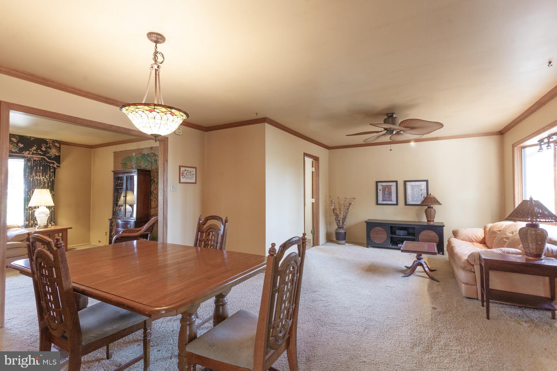 514 Drexel Road Fairless Hills, PA 19030 - Photo 12 of 31 a view of a a dining room with furniture window and wooden floor