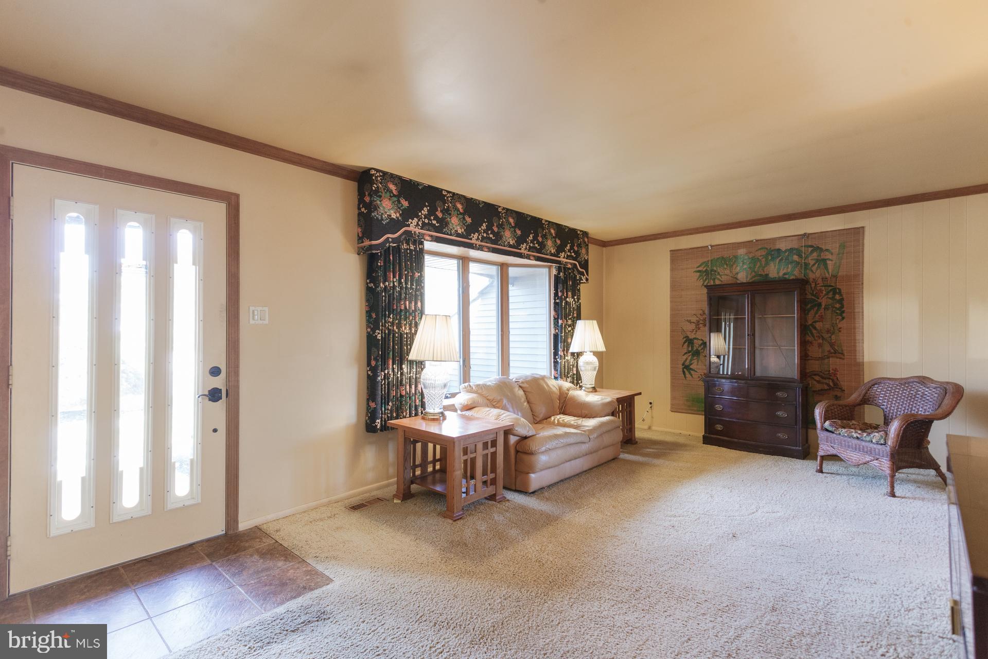 514 Drexel Road Fairless Hills, PA 19030 - Photo 2 of 31 a living room with furniture and a window