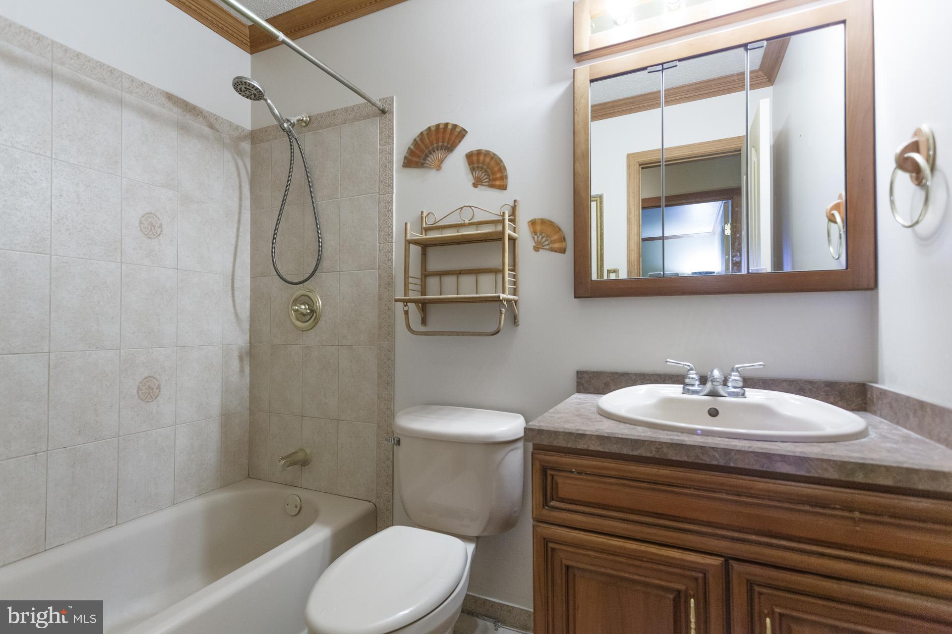 514 Drexel Road Fairless Hills, PA 19030 - Photo 25 of 31 a bathroom with a sink toilet and shower
