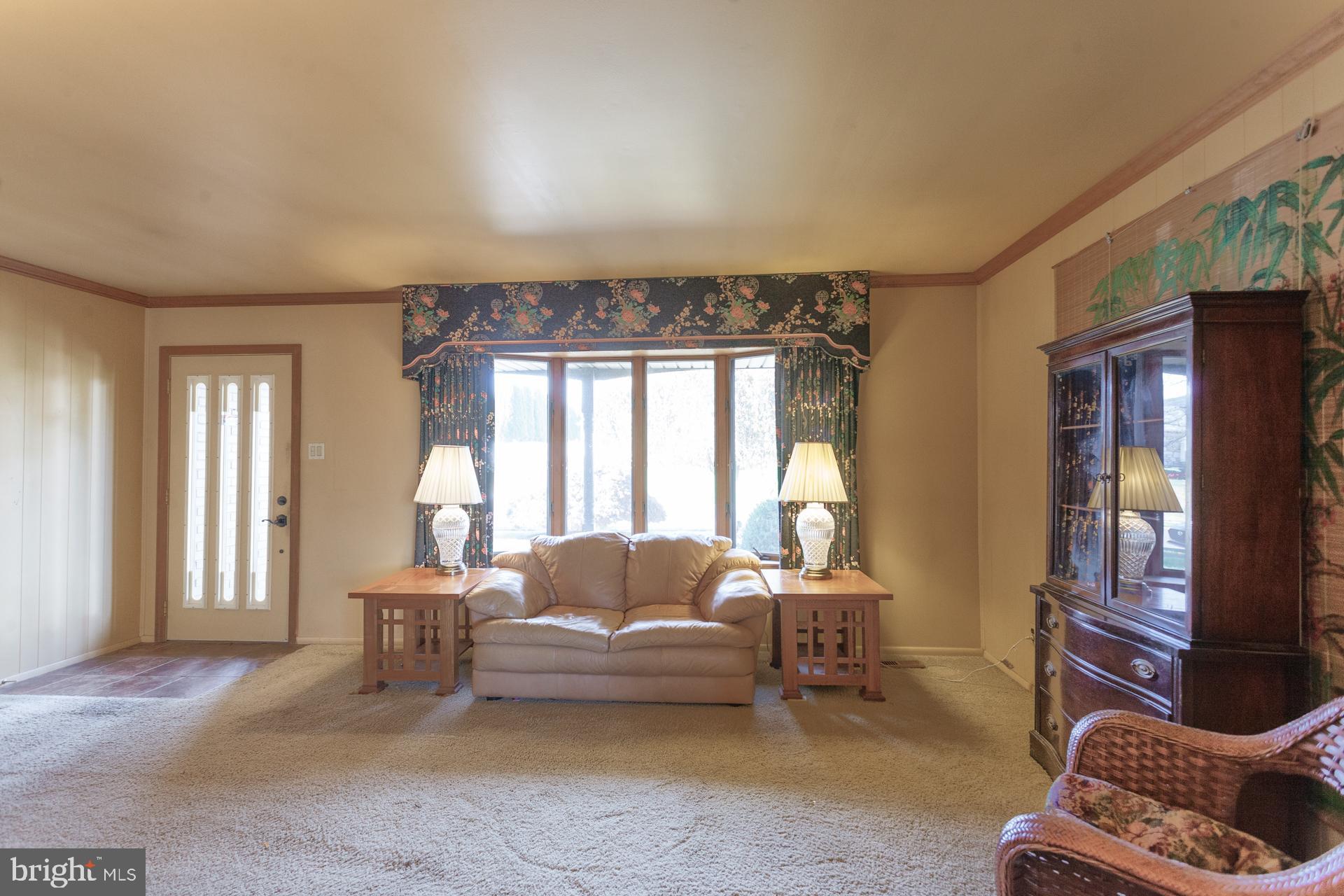 514 Drexel Road Fairless Hills, PA 19030 - Photo 3 of 31 a living room with furniture and a window