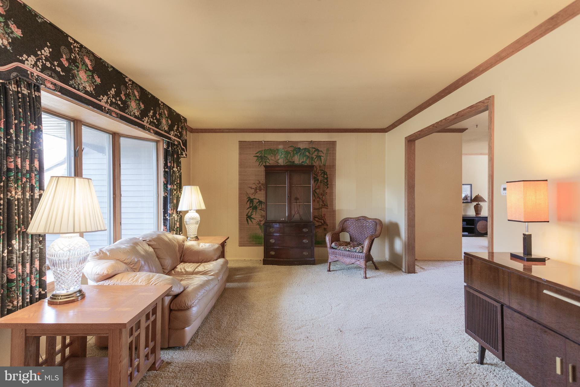 514 Drexel Road Fairless Hills, PA 19030 - Photo 4 of 31 a living room with furniture and a lamp