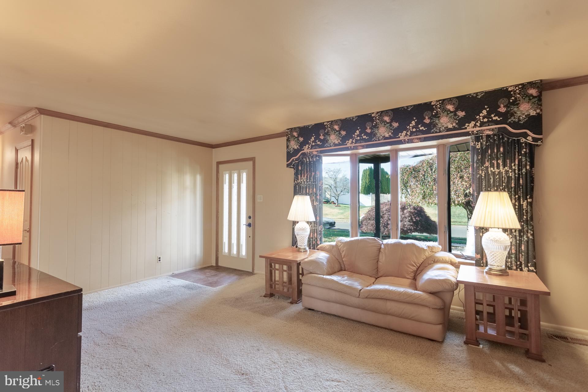 514 Drexel Road Fairless Hills, PA 19030 - Photo 5 of 31 a living room with furniture and a large window