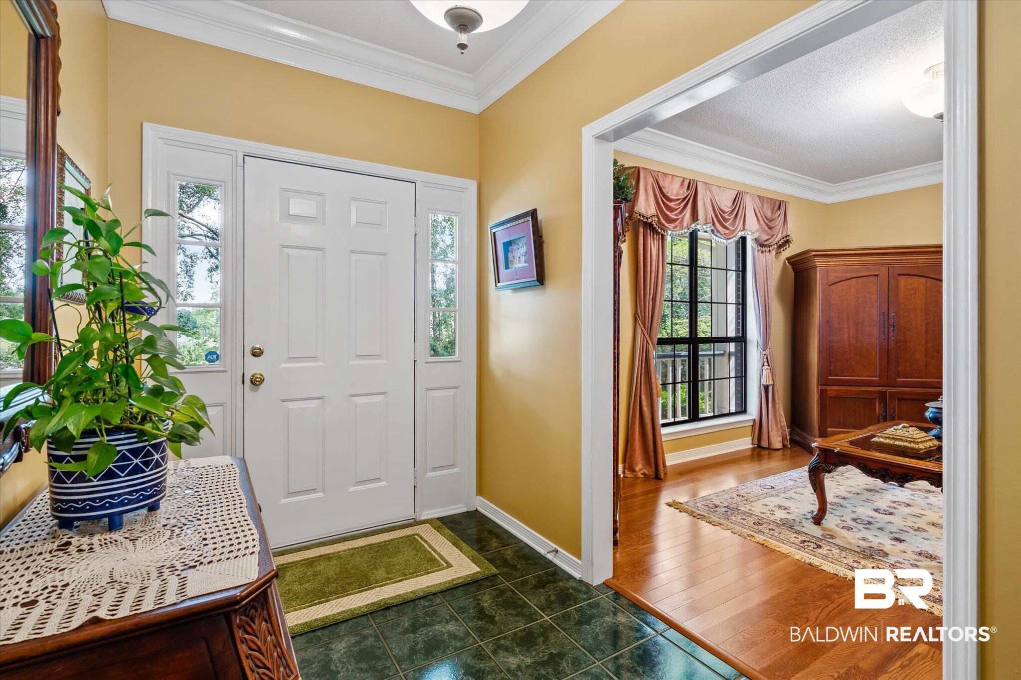 7360 Bridgewood Court Mobile, AL 36695 - Photo 3 of 30 Foyer with ornamental molding, dark wood-type flooring, and a wealth of natural light