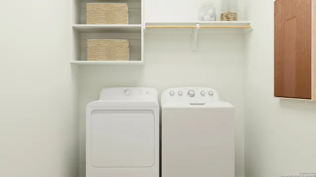 a utility room with dryer and washer