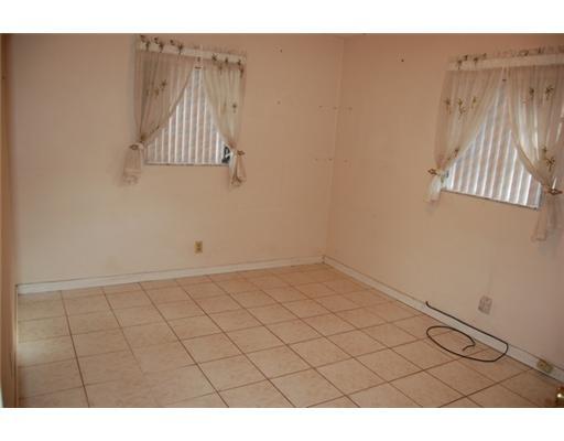 201 Northeast 26th Street Boca Raton, FL 33431 - Photo 16 of 18 a view of a closet area