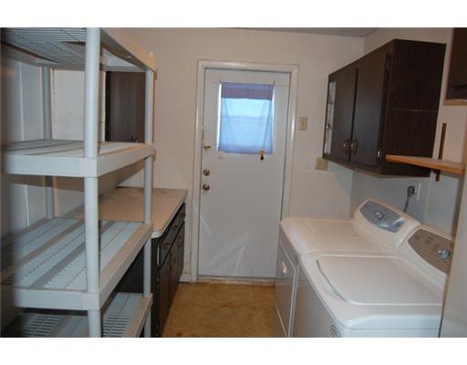 201 Northeast 26th Street Boca Raton, FL 33431 - Photo 10 of 18 a bathroom with a sink a vanity and a mirror