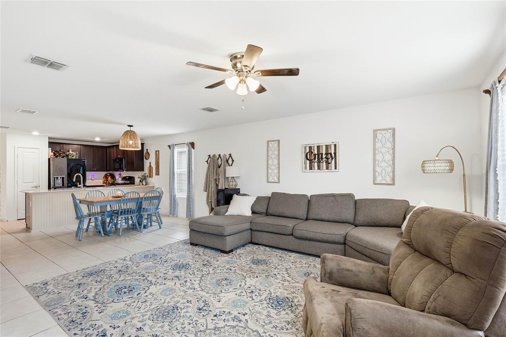 312 Ranchito Pass Fort Worth, TX 76052 - Photo 11 of 30 Living area with a ceiling fan, light tile patterned flooring, and recessed lighting
