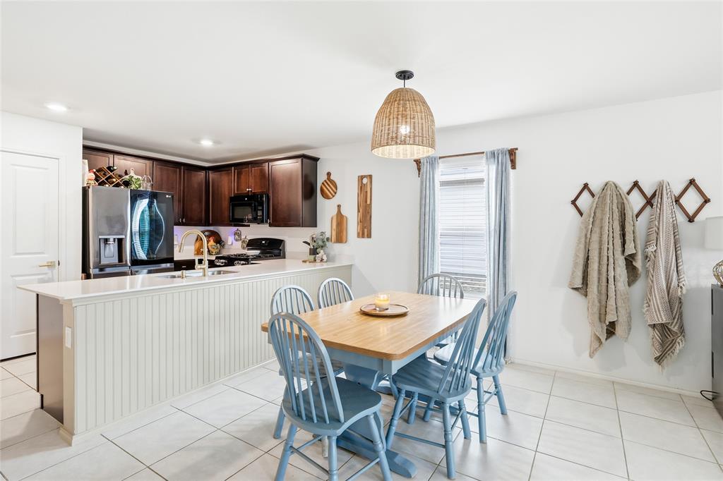 312 Ranchito Pass Fort Worth, TX 76052 - Photo 17 of 30 Dining room featuring light tile patterned floors and recessed lighting