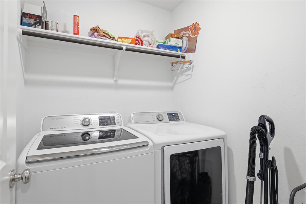 312 Ranchito Pass Fort Worth, TX 76052 - Photo 19 of 30 Laundry room with washing machine and clothes dryer