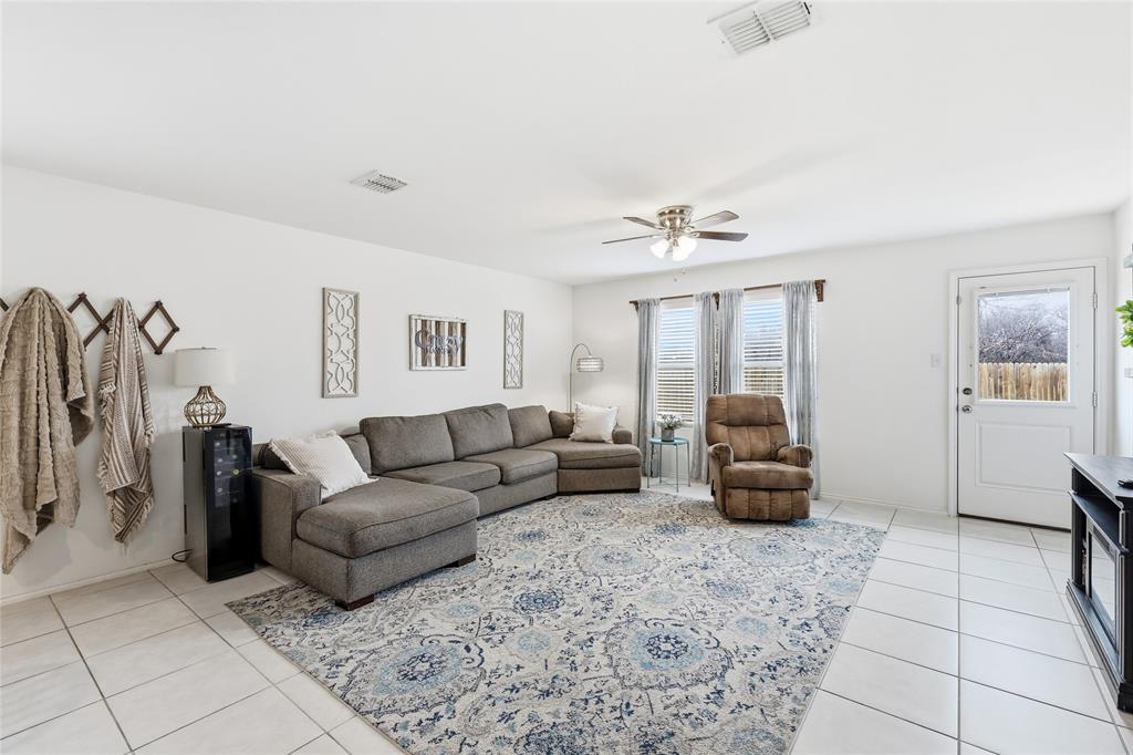 312 Ranchito Pass Fort Worth, TX 76052 - Photo 8 of 30 Living area featuring ceiling fan and light tile patterned flooring