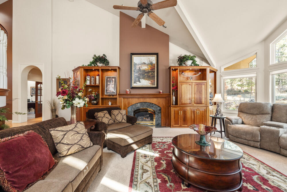 11629 Merganser Road Klamath Falls, OR 97601 - Photo 10 of 50 a living room with furniture and a fireplace