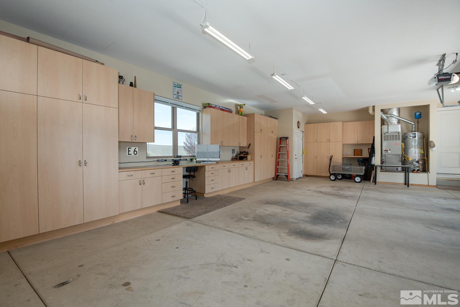 334 James Canyon Loop Genoa, NV 89411 - Photo 24 of 36 a view of a kitchen with a sink