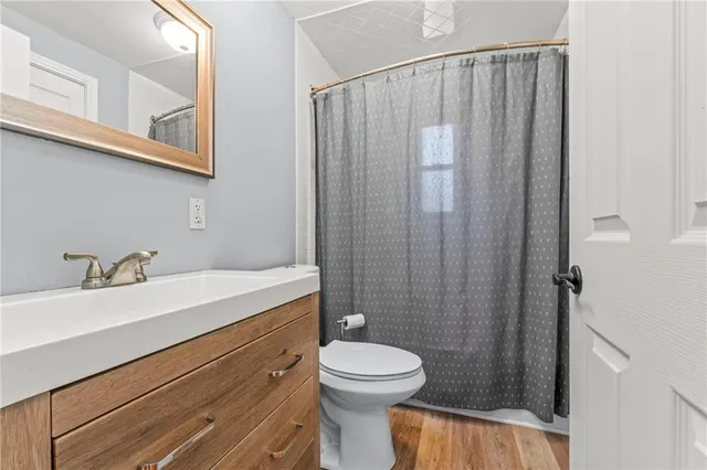 a picture of a bathroom with a window
